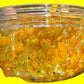 Jar of yellow slime with honeycomb decorations