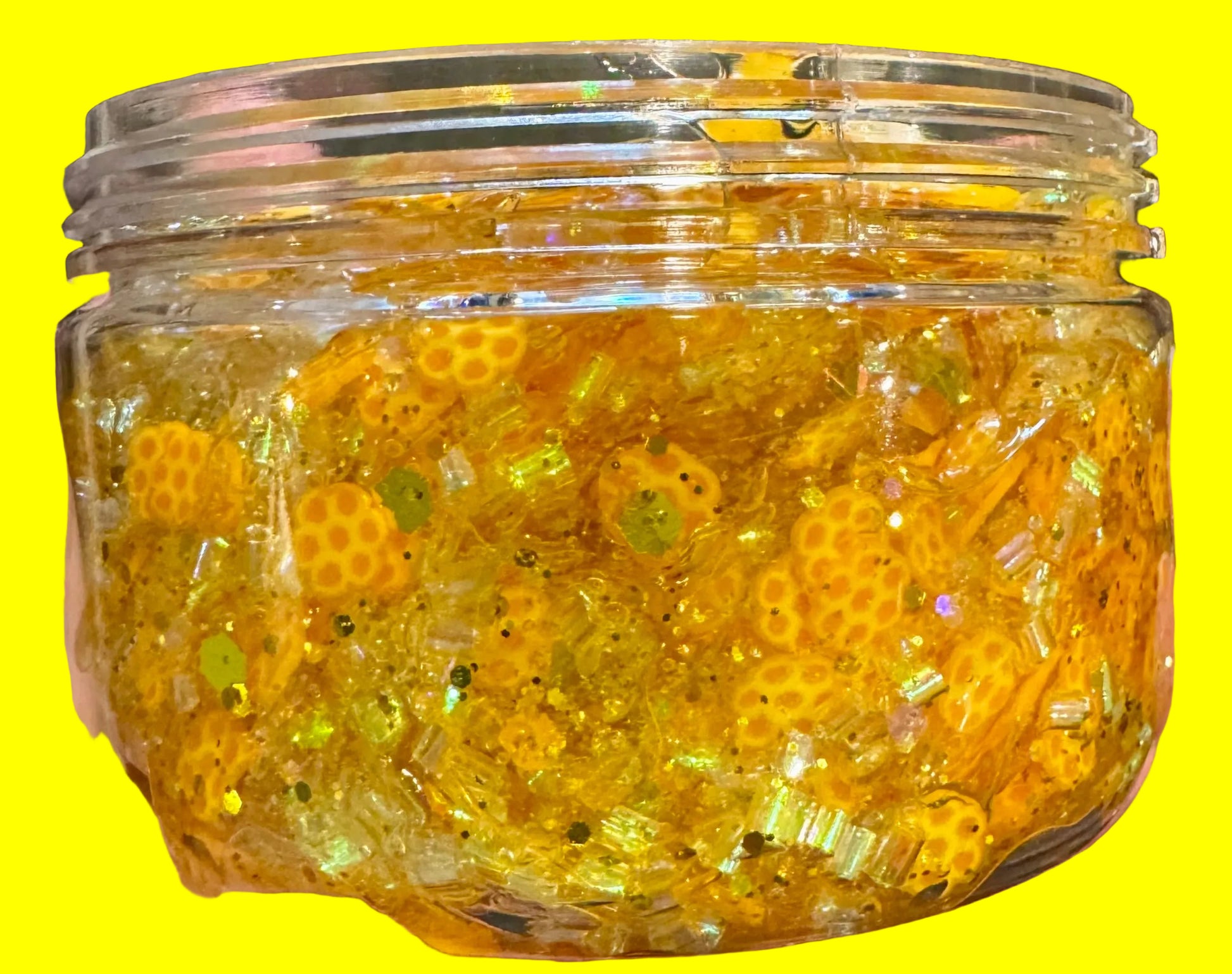 Jar of yellow slime with honeycomb decorations